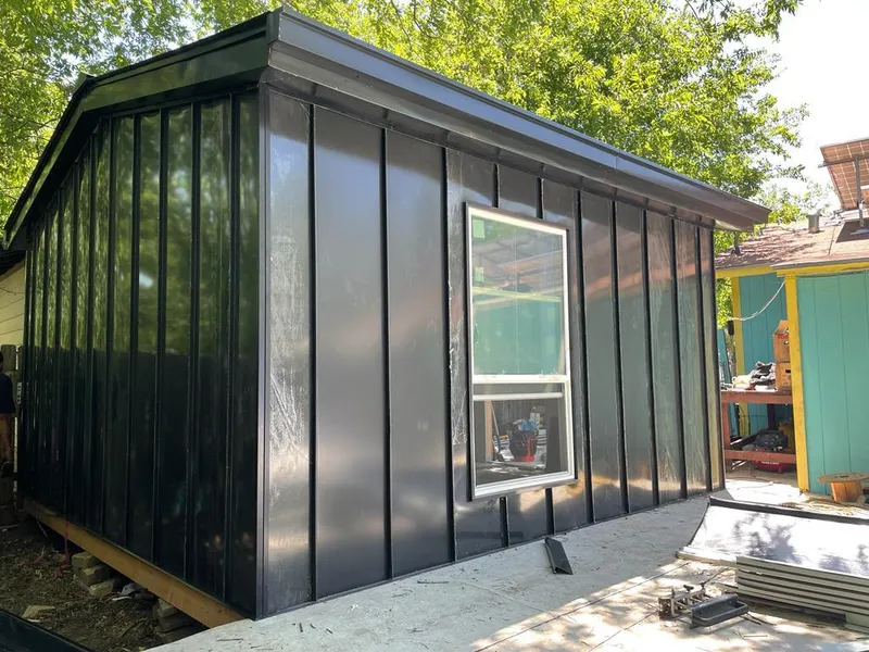 Black standing seam metal wall panels for Metal Roof Installation in Mansfield