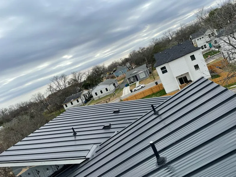 Standing seam metal roof panels with vents for Skylight Repair in Mansfield